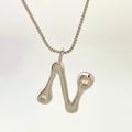 Minimalist silver initial N pendant necklace with droplet design and sparkling zircons - Silver N