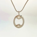 Elegant silver oval pendant necklace featuring dual sparkling zircon stones on a box chain - Silver O