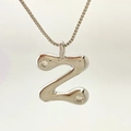 Polished silver letter Z pendant necklace with sparkling cubic zirconia on a box chain - Silver Z