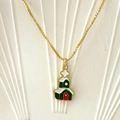 Festive gold box chain necklace featuring a colorful Christmas house pendant with snow - Church in Snow Style (Style H)
