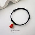 Detail of red strawberry pendant on black braided rope bracelet with dimensions shown - Strawberry Design (3 Styles 08-0175)