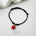 Detailed macro view of black braided rope bracelet with red star charm and dimensions - Five-Pointed Star Style (Style 11 08-0175)