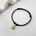 Minimalist black braided bracelet with a polished gold star pendant and adjustable cord - Gold Star - Black Rope (2)