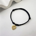 Minimalist black rope bracelet with a gold-plated double heart pendant and zircons - Zirconia Double Heart - Black Rope (6)