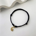 Minimalist black woven rope bracelet with gold-plated moon and sun zircon charms - Zirconia Moon Sun - Black Rope (5)