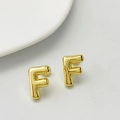 Polished gold balloon style letter F stud earrings with a glossy three-dimensional finish - Gold F