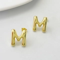 Minimalist polished gold letter M stud earrings for women in modern stainless steel design - Gold M
