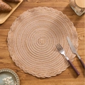 Brown and beige circular woven placemat with rustic braided lace edges in a lifestyle setting - Small / Coffee