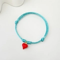 Handmade light blue braided cord bracelet featuring a vibrant red heart pendant charm - Blue Cord Red Heart (Style 17 08-0175)