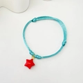 Handmade sky blue woven bracelet featuring a red star pendant and adjustable cord - Blue Cord Bright Star (Style 23-08-0175)