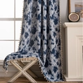 Detailed view of blue floral jacquard curtain with cream fringe tassels in rustic style - Rod Pocket / 150x160 / Blue