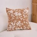 Chenille jacquard throw pillow with caramel floral pattern on a white textured sofa - Garden Khaki