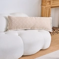 Detail of a rectangular lumbar pillow with beige chevron weaving and fringe on a white sofa - Khaki Wave (4568)