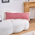 Detail of red jacquard long pillow with tassels on white cloud sofa in cozy room - Red Block (4568)