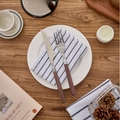 Brown wooden handle stainless steel cutlery set with blue striped napkins - White Pinstripes