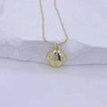 Golden cupcake pendant necklace with zircon accents on a textured white stone background - Cupcake Style (Gold 1)