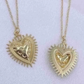 Minimalist gold sacred heart pendant necklace featuring textured crown and sunburst design - Crown Radiant Style / Gold 2