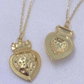 Golden heart necklace with crown detail and hammered texture on a silk background - Crown Hammered Style / Gold 3