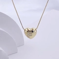 Polished gold heart necklace featuring a letter F crystal inlay on a delicate box chain - Gold F