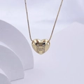 Golden heart pendant necklace with letter H and sparkling crystals on white background - Gold H