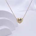 Polished gold heart necklace pendant with white zircon stones on a box chain - Gold O