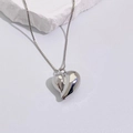 Macro detail of high-polish heart pendant and delicate silver box chain necklace - Small Heart Pendant (Style A) / Type A Silver