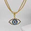 Primer plano del colgante de ojo turco con piedras azules y detalle de estrella en el cierre - Estilo con Textura Pavé (Estilo C)