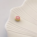 Detail einer pinkfarbenen Emaille-Abstandshülse mit Goldrand für die DIY-Schmuckherstellung - Stil A-06 (Runde Böser Blick)