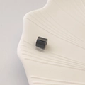 Makroaufnahme polierter schwarzer zylindrischer Perlen mit Loch für DIY-Schmuck - Stil C-Schwarz (Zylinder Abstandsperle)