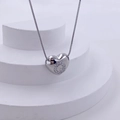 Polished heart pendant necklace featuring sparkling micro-set letter Q in silver finish - Silver Q