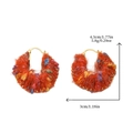 Handmade orange yarn hoop earrings with colorful textured knit details and gold hooks - Orange Plush Hoop