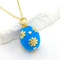 Blue enamel Easter egg pendant necklace with 14K gold flower patterns and gems - Sky Blue