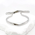 Minimalist silver hammered double wave open cuff bracelet for women in metallic finish - Silver