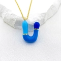 Bubble letter U necklace pendant with colorful blue enamel finish and gold chain - Letter U Style