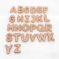 Detailed set of 26 rose gold bubble letters with pavé zircon stones on white silk - Letter A / Letter A / Rose Gold