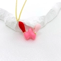 Letter W bubble pendant necklace with red and pink enamel drip on a gold chain - Letter W Style