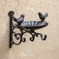 Macro shot of cast iron bird feeder wall hook with vintage brown finish and bird details - Double Bird Feeder Hook (5308)