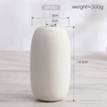 Minimalist beige ceramic flower vase with horizontal rib texture for home tabletop decor - Off-White Ribbed Cylindrical Vase (HP004)