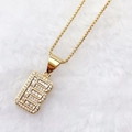 Golden necklace featuring Zirconia-encrusted letter B pendant on soft white fur - Gold E