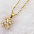 Elegant gold cross pendant necklace featuring rectangular and round cubic zirconia - Gold X