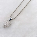 Letter F necklace featuring cubic zirconia flower pendant on a sleek box chain - Silver F