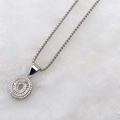Silver-toned round necklace with tiered pave zircon circles and popcorn chain - Silver O