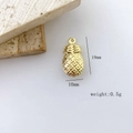Detailed close-up of golden pineapple charm with 19x10mm size and 0.5g weight info - Pineapple