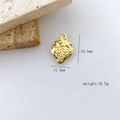 Macro view of gold strawberry charm with 15.5mm size and realistic seed texture - Strawberry Shape