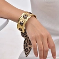 Golden hammer-textured wide open bangle with leopard print silk ribbon tied in a bow - Gold Style (B-630)