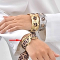 Golden cuff bracelet featuring animal leopard print fabric inlay and textured metal finish - Gold Style (B-750)