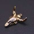 Macro shot of gold plated bull head pendant with intricate bohemian texture details - No. 4 (Bright Gold)