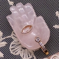 Elegant gold-plated marquise and round cut stone ring displayed on a palm holder - 17x32mm / Rose Quartz