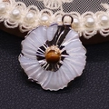 Natural white shell flower pendant with tiger eye center and golden metal plating - Tiger's Eye