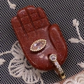 Hamsa hand pendant in red goldstone with sparkling finish and evil eye crystal - 17x32mm / Gold Sandstone